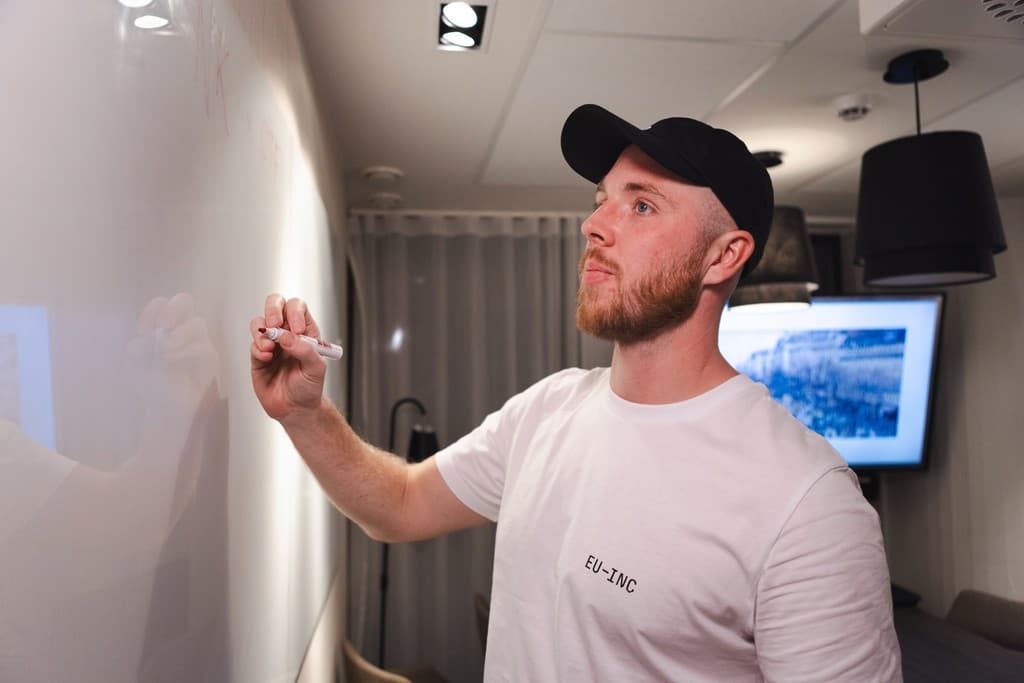 Sam Rowland at the whiteboard